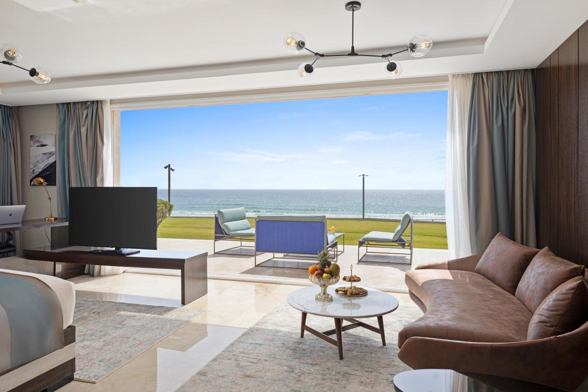 Pickalbatros White Beach Taghazout (Adults Only) Extérieur photo A living room in a luxury apartment